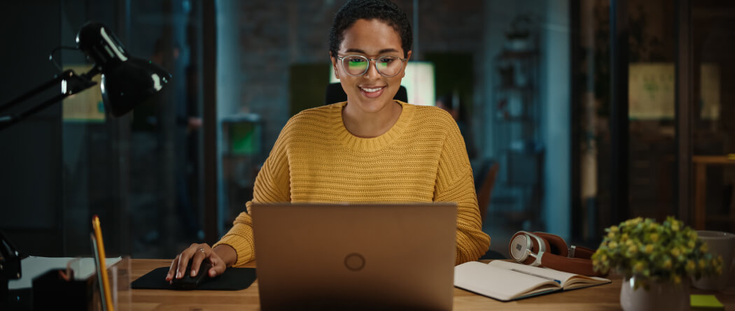 a woman working on her laptop